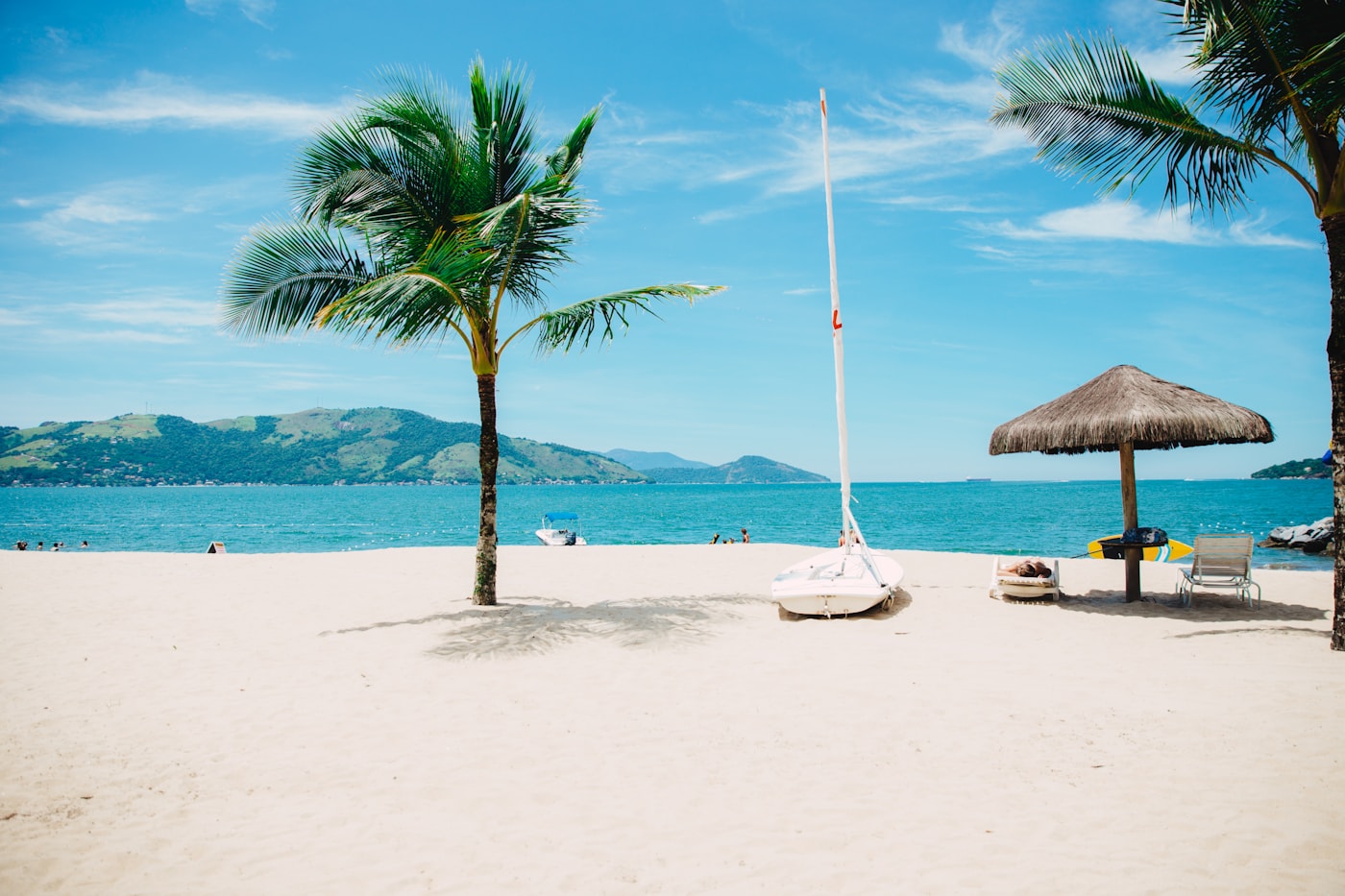 White sand beach meeting clear water